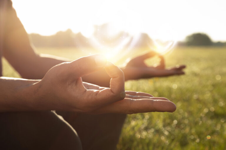 side-view-adult-meditating-outdoors